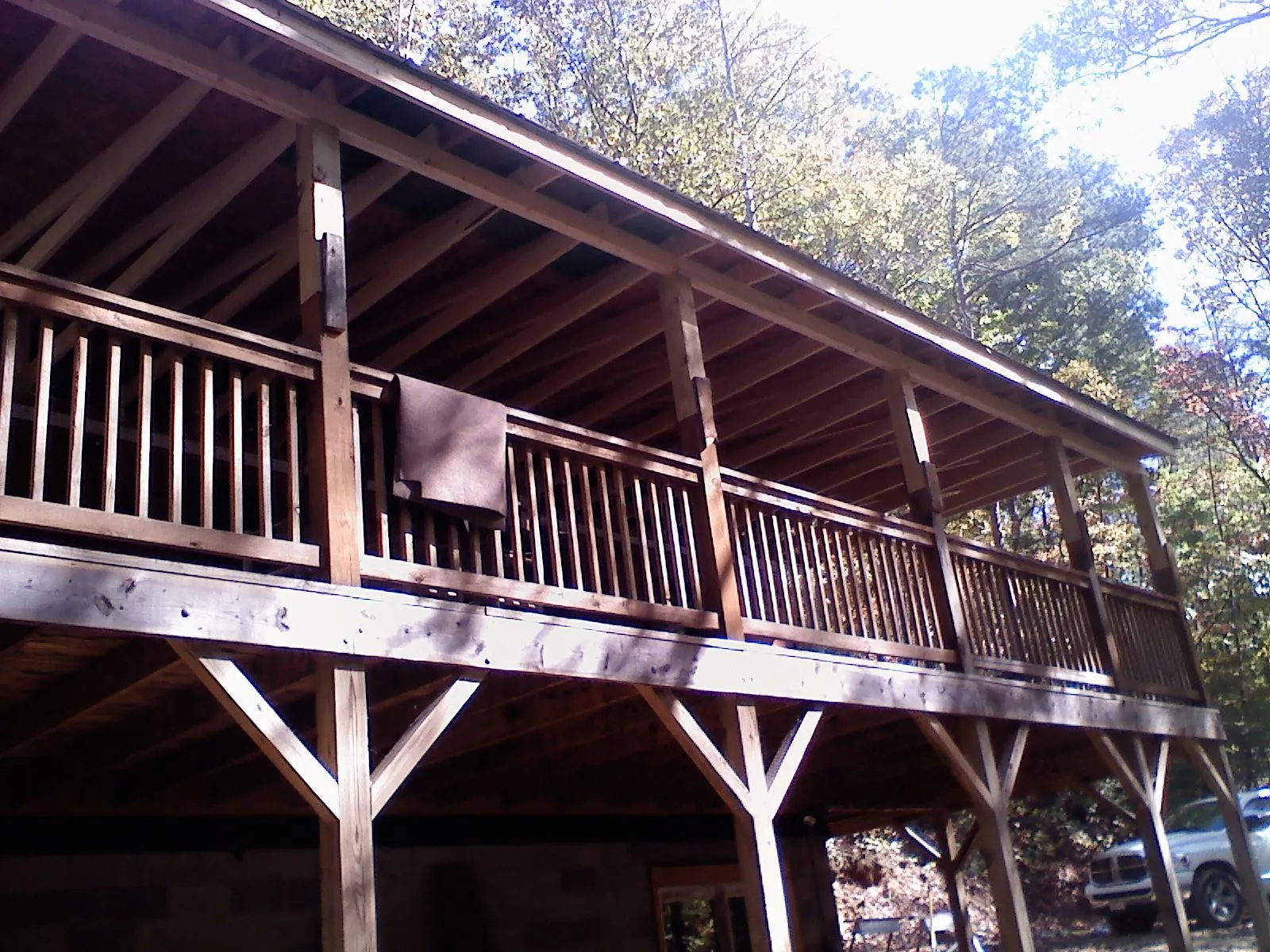 Timber framing under a new elevated porch and deck — Roof Leak Repair in Amlin by Roofing Brothers